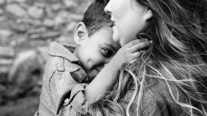 son hugging his mother