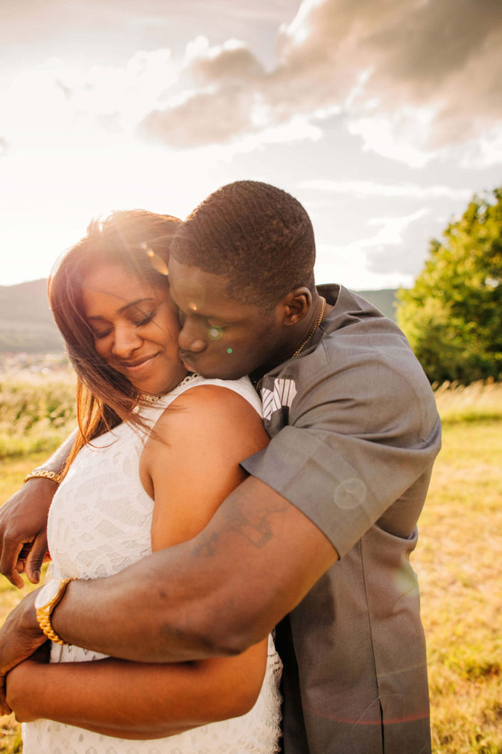 Couple hugging during sunset